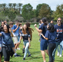 students gathered in the field